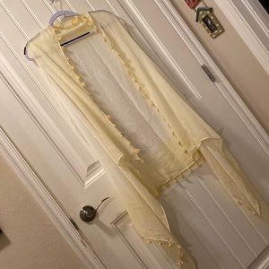 Sheer cardigan with tassels. Off white and yellow ombre. One size.